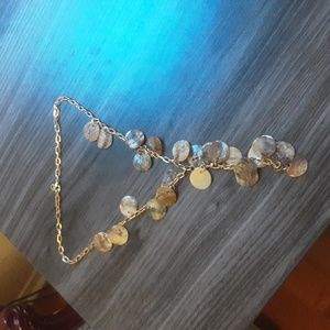 Shell design gold coloured y necklace